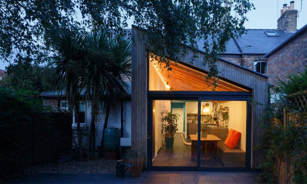 extension of home at night illuminated by lights