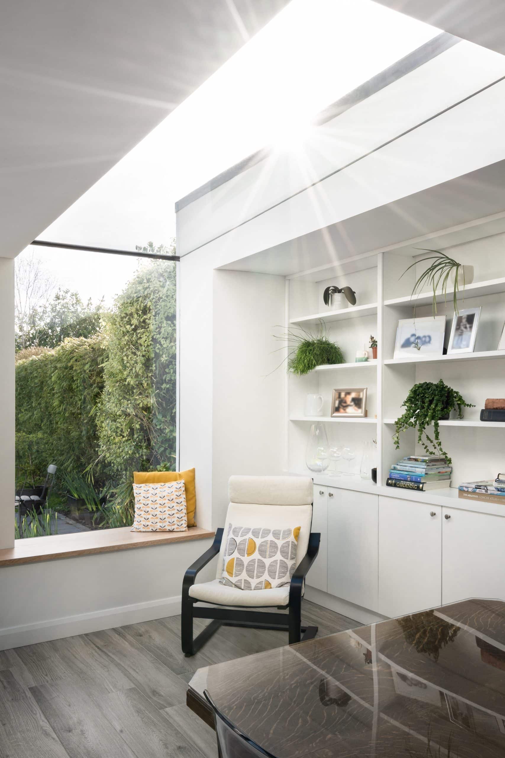 Glazing Vision Flushglaze Eaves rooflight installed in living room by a chair and pillow