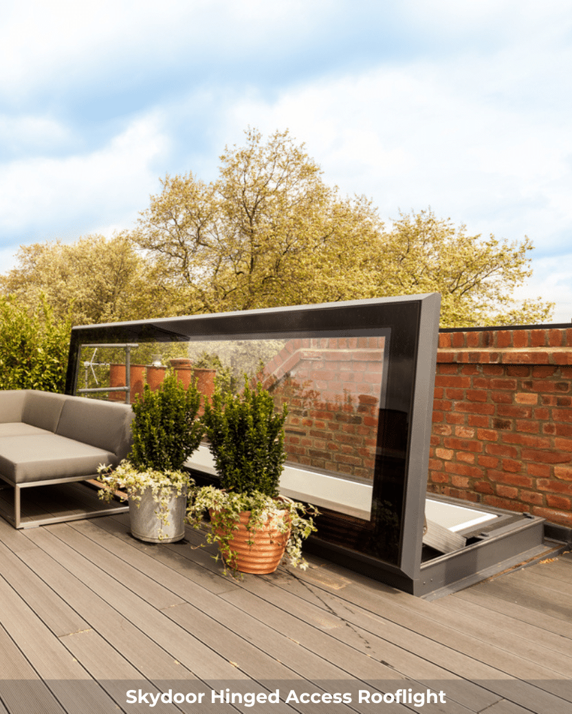 opening rooflight installed on a wooden roof terrace by potted plants