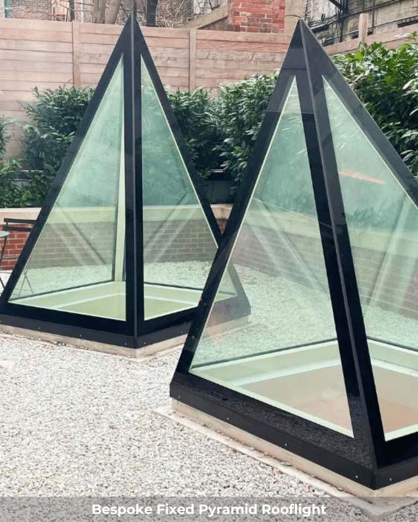 pyramid rooflights installed on a white roof terrace